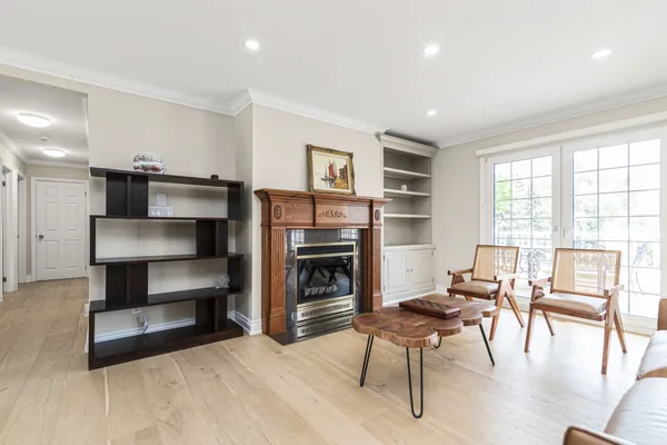 The farmhouse living room, warm and ready for guests
