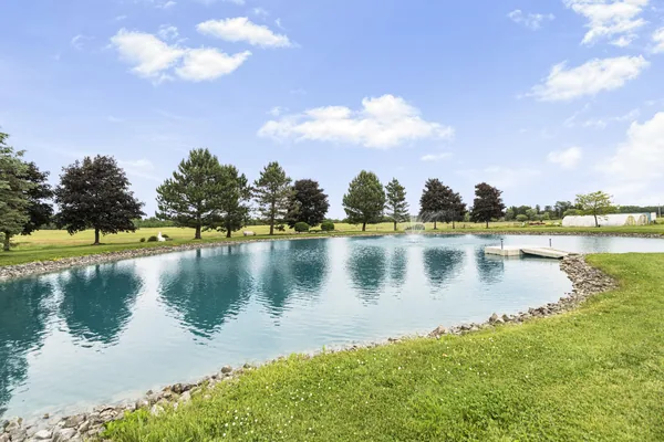 The pond, its fountain, and the private dock